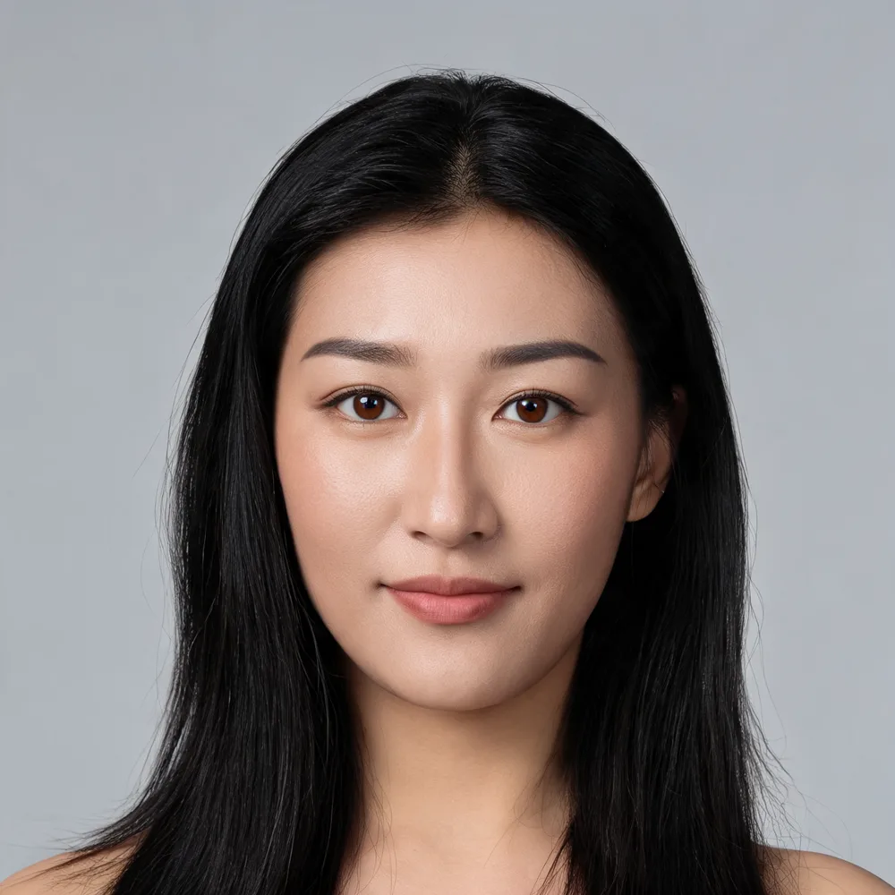 First input: woman with long dark hair against a gray background.